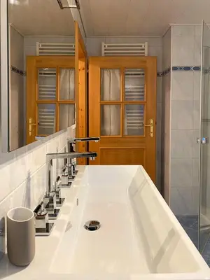 Ein Badezimmer in der Unterkunft Ferienhaus s'Mosern