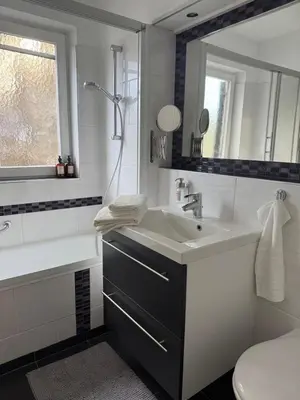 Ein Badezimmer in der Unterkunft Bergzeit Apartments