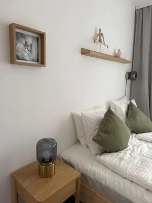 Ein Bett oder Betten in einem Zimmer der Unterkunft Bergzeit Apartments
