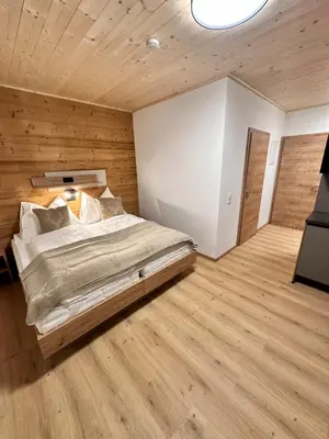 Ein Bett oder Betten in einem Zimmer der Unterkunft Alpin Studio Schladming 103