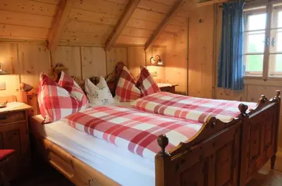 Ein Bett oder Betten in einem Zimmer der Unterkunft Oberprenner Troadkostn