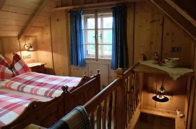 Ein Bett oder Betten in einem Zimmer der Unterkunft Oberprenner Troadkostn