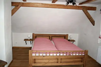 Ein Bett oder Betten in einem Zimmer der Unterkunft Landhaus Gschwandtner