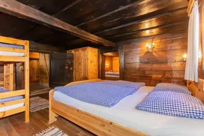 Ein Bett oder Betten in einem Zimmer der Unterkunft Radlehenhütte