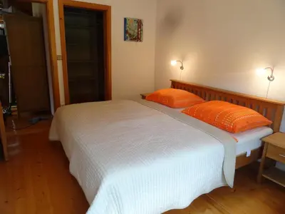 Ein Bett oder Betten in einem Zimmer der Unterkunft Ferienhaus am Fluss, zentrale Lage
