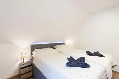 Ein Bett oder Betten in einem Zimmer der Unterkunft Appartements Gasthaus Eichholzer
