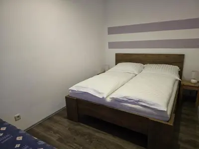 Ein Bett oder Betten in einem Zimmer der Unterkunft Murblick