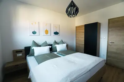 Ein Bett oder Betten in einem Zimmer der Unterkunft Schladming-Top1