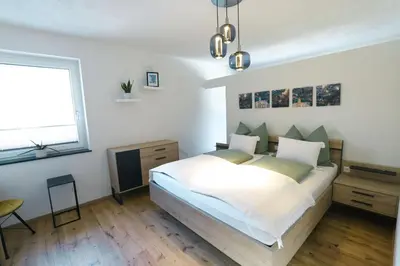 Ein Bett oder Betten in einem Zimmer der Unterkunft Schladming-Top1