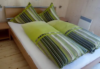 Ein Bett oder Betten in einem Zimmer der Unterkunft Chalet Hamito