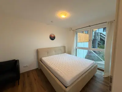 Ein Bett oder Betten in einem Zimmer der Unterkunft Apartment Sonnenberg