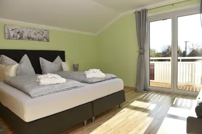 Ein Bett oder Betten in einem Zimmer der Unterkunft Haus Sonnenschein Mariapfarr