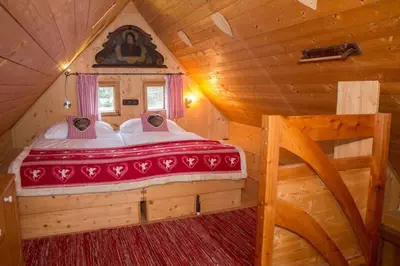 Ein Bett oder Betten in einem Zimmer der Unterkunft Kuschelhütte