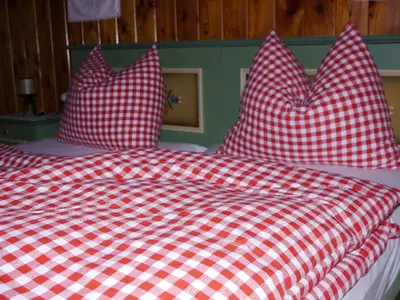 Ein Bett oder Betten in einem Zimmer der Unterkunft Kappacher Hütte