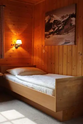 Ein Bett oder Betten in einem Zimmer der Unterkunft Gottschallalm