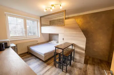 Ein Bett oder Betten in einem Zimmer der Unterkunft Apartmenthaus 113