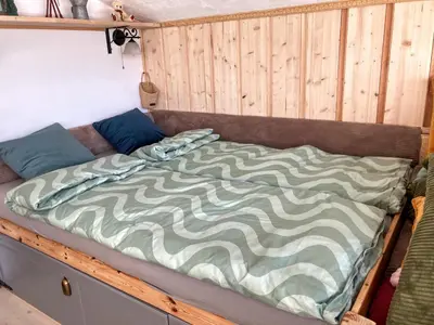 Ein Bett oder Betten in einem Zimmer der Unterkunft Dachstein Stüberl