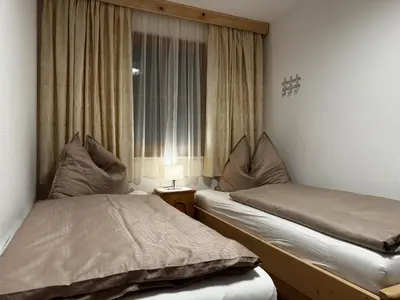 Ein Bett oder Betten in einem Zimmer der Unterkunft Ferienwohnung Muss
