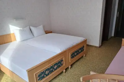 Ein Bett oder Betten in einem Zimmer der Unterkunft Pension Karner