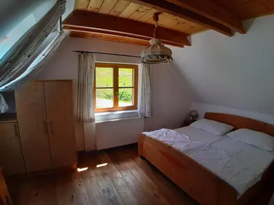 Ein Bett oder Betten in einem Zimmer der Unterkunft Holiday Home Lachtalhütte by Interhome