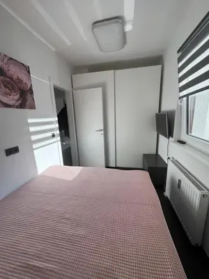 Ein Bett oder Betten in einem Zimmer der Unterkunft Appartement Märzenkeller