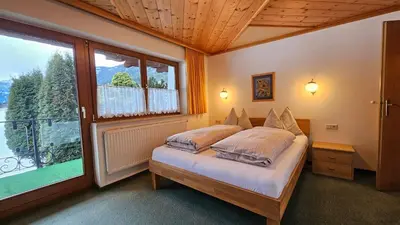 Ein Bett oder Betten in einem Zimmer der Unterkunft Landhaus Gollegger Appartements Flachau