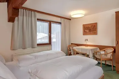 Ein Bett oder Betten in einem Zimmer der Unterkunft Landhaus Gollegger Appartements Flachau