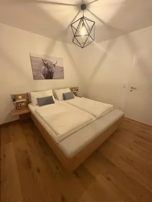 Ein Bett oder Betten in einem Zimmer der Unterkunft Appartement Fellsattler