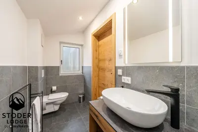 Ein Badezimmer in der Unterkunft StoderLodge - Alpine Garden Residence - by myNests