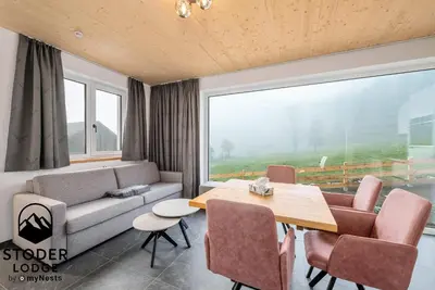 Ein Sitzbereich in der Unterkunft StoderLodge - Alpine Garden Residence - by myNests