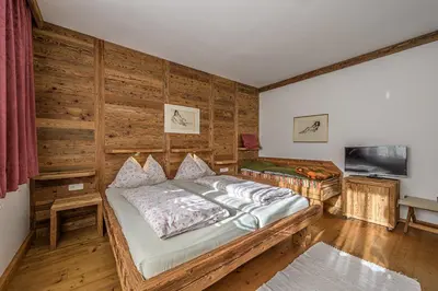 Ein Bett oder Betten in einem Zimmer der Unterkunft Haus Kogler