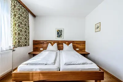 Ein Bett oder Betten in einem Zimmer der Unterkunft Haus Kogler