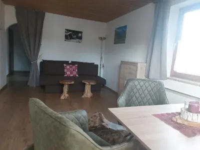 Ein Sitzbereich in der Unterkunft Appartement Hödlmoser