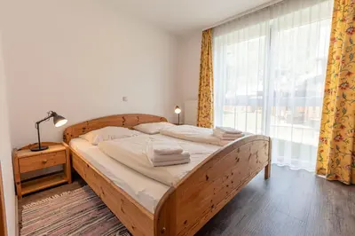 Ein Bett oder Betten in einem Zimmer der Unterkunft FerienPark Kreischberg Ferienhäuser by ALPS RESORTS