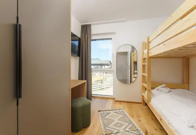 Ein Bett oder Betten in einem Zimmer der Unterkunft Enns Collection Planai West by Schladming-Appartements