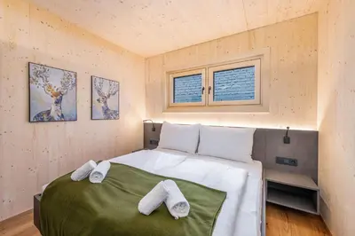 Ein Bett oder Betten in einem Zimmer der Unterkunft Panorama 198 - Schladming Tiny House - by myNests