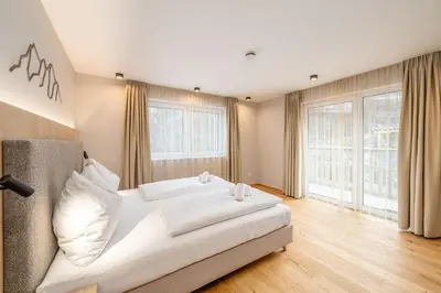 Ein Bett oder Betten in einem Zimmer der Unterkunft Apart Erle 181 - by myNests