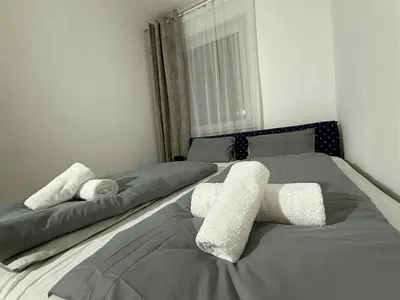 Ein Bett oder Betten in einem Zimmer der Unterkunft Relax Wohnung