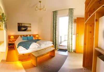 Ein Bett oder Betten in einem Zimmer der Unterkunft Apartment Haus Braumandl