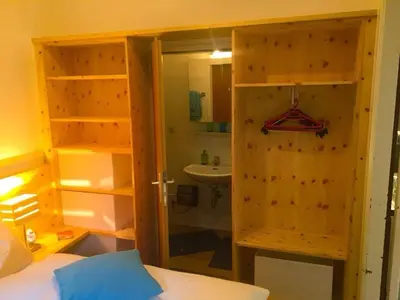 Ein Bett oder Betten in einem Zimmer der Unterkunft Apartment Haus Braumandl