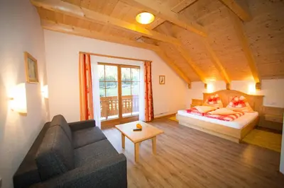 Ein Bett oder Betten in einem Zimmer der Unterkunft Rojerhof