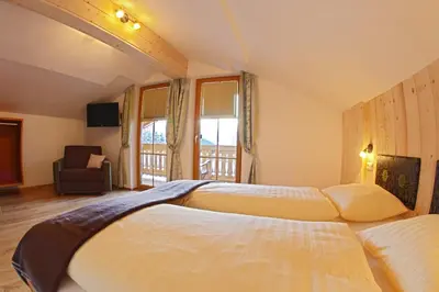 Ein Bett oder Betten in einem Zimmer der Unterkunft Familien-Bauernhof Neumoar