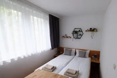 Ein Bett oder Betten in einem Zimmer der Unterkunft Kleines aber Feines Apartment über Schladming