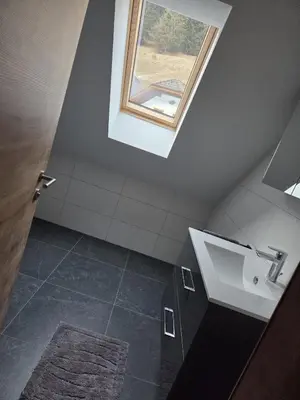 Ein Badezimmer in der Unterkunft Apartment Altenberger
