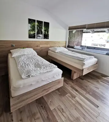 Ein Bett oder Betten in einem Zimmer der Unterkunft Apartment Alpenblick Bad Aussee