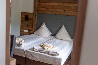 Ein Bett oder Betten in einem Zimmer der Unterkunft Ferienwohnung Grundlsee