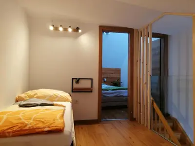 Ein Bett oder Betten in einem Zimmer der Unterkunft Appartement HochOben