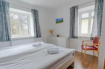 Ein Bett oder Betten in einem Zimmer der Unterkunft Ferienwohnung Ahammer