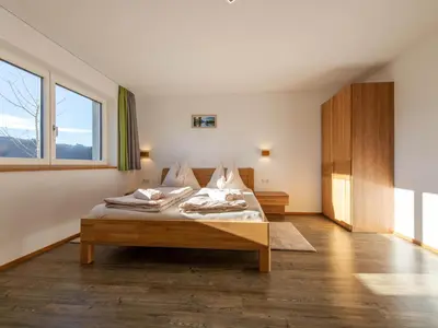 Ein Bett oder Betten in einem Zimmer der Unterkunft Mountain Apartment