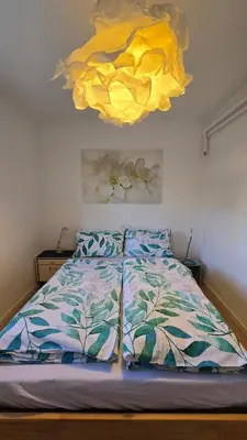 Ein Bett oder Betten in einem Zimmer der Unterkunft The Garden Residence